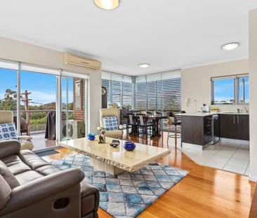 Spacious, Modern & Perfectly Positioned - Photo 1