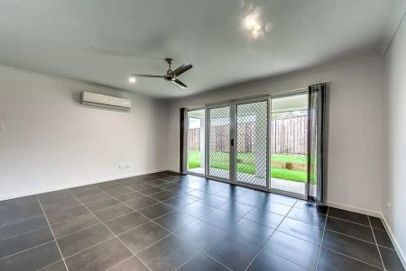 “Modern Family Home in Heathwood” - Photo 3