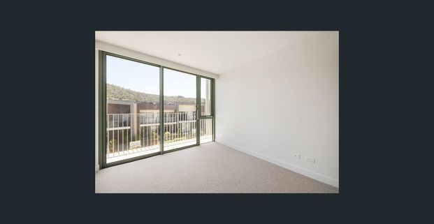 Waterfront Living at Its Finest – Stylish 1st Level Apartment - Photo 1