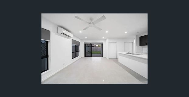 SPACIOUS FOUR-BEDROOM HOME WITH ALFRESCO LIVING - Photo 1