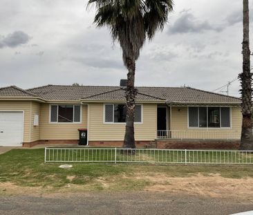 NEAT & TIDY THREE BEDROOM HOME - Photo 1