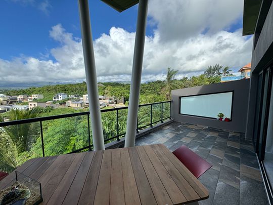 A LOUER - Saint-Benoit - Appartement T3 nu de 72 m2 habitable au dernier étage avec vue mer - Photo 1
