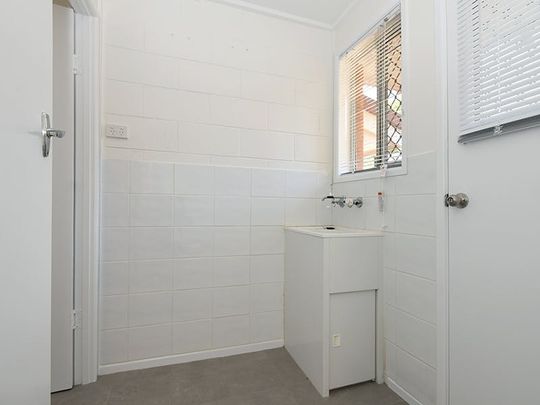 Renovated unit in sought after location - Photo 1