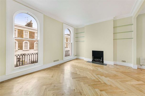 A first and second floor maisonette, benefitting from a private roof terrace, and wooden floors in the living area, conveniently located moments from the amenities of Kings Road SW3. - Photo 1