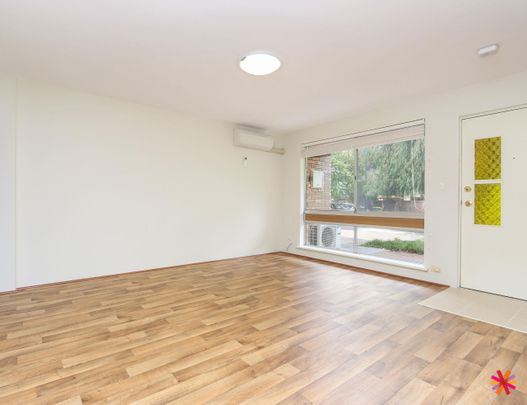 COMFORTABLE LIVING IN DESIRABLE LOCATION - Photo 1