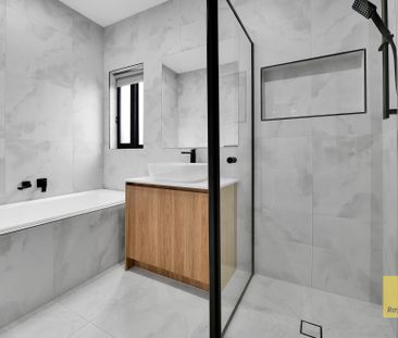 Brand New Family Home with Two Living Areas, Study Nook & Heating/C... - Photo 4