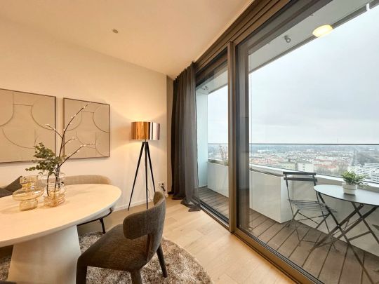 DANUBE FLATS | Vollmöblierte 1,5-Zimmer-Wohnung im 18. Stock mit Wienblick | Pool | Fitness - Photo 1