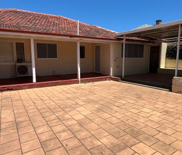 Charming Elevated Home - Photo 1