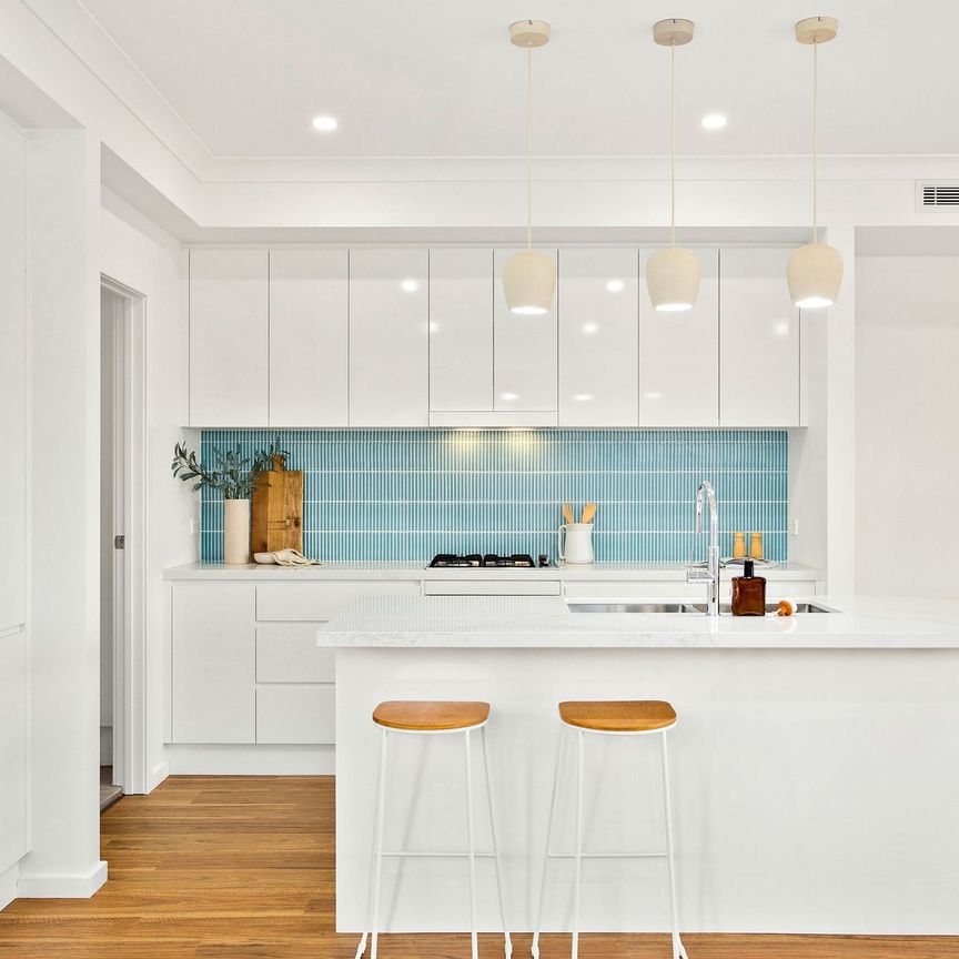 Brand New Duplex with Sophisticated Design & Effortless Living - Photo 1