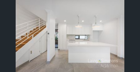 Immaculately renovated two Bedroom split-level Townhouse + Loft / Storage - Photo 2