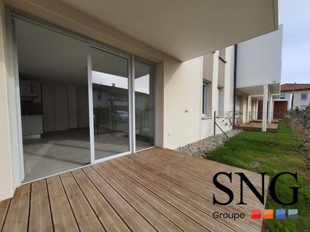T2 AVEC TERRASSE ET JARDIN + 2 PARKINGS SOUS SOL - Photo 2