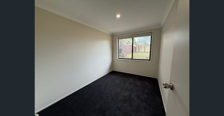 Beautiful Renovated 4-Bedroom Home | Schools & Shops only seconds away - Photo 3