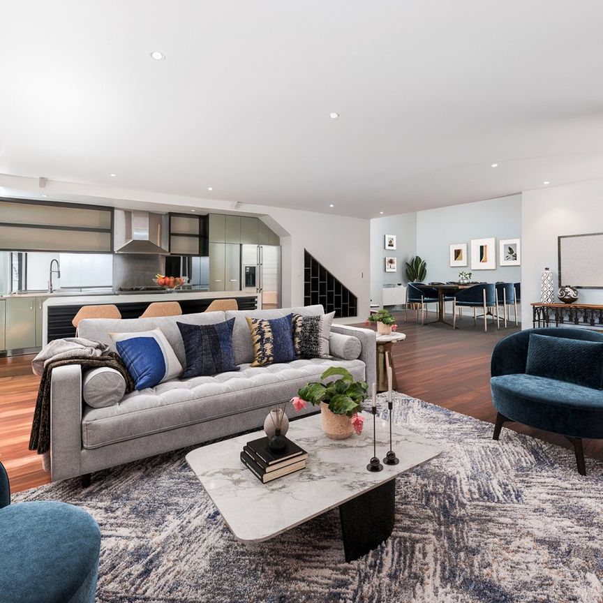 SPACIOUS FAMILY LIVING IN A QUIET TREE-LINED POCKET - Photo 1