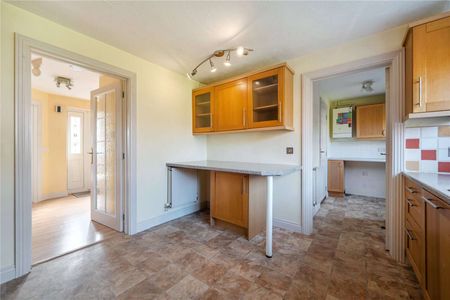 A practical detached four-bedroom home with integral garage. - Photo 5