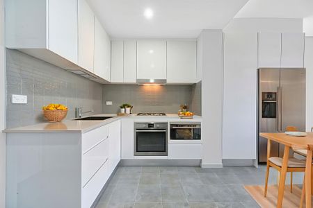 MODERN APARTMENT WITH BALCONY, PARKING, AND STORAGE IN A QUIET BOUTIQUE BLOCK - Photo 4