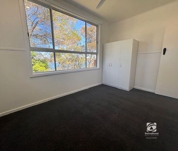 FRESHLY RENOVATED ON THE LAKES EDGE! - Photo 2