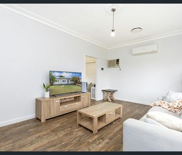 Stunningly Renovated Home with Large Backyard – A Must-See! - Photo 1