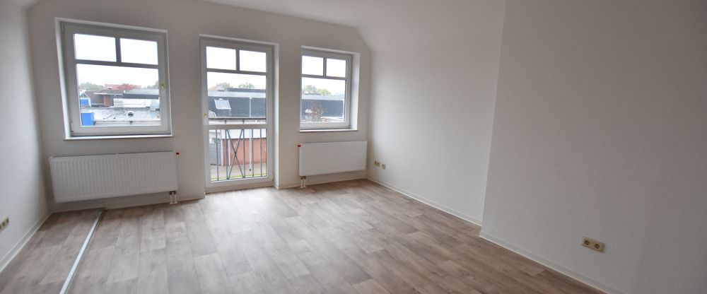 Maisonettewohnung im Zentrum von Warsingsfehn - Foto 1