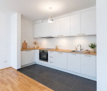 Moderne Terrassenwohnung mit kleinem Garten ab 1.7. - Photo 3