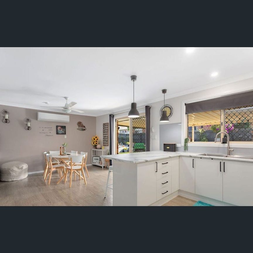 Modern Comfort in a Family-Friendly Location - Photo 1