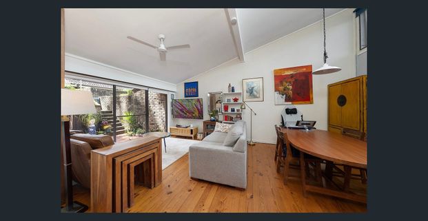 Sunlit Split-Level Townhouse Offering Space, Style & Convenience - Photo 1