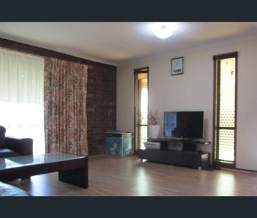 This Cozy Brick Family Home Awaits - Photo 1