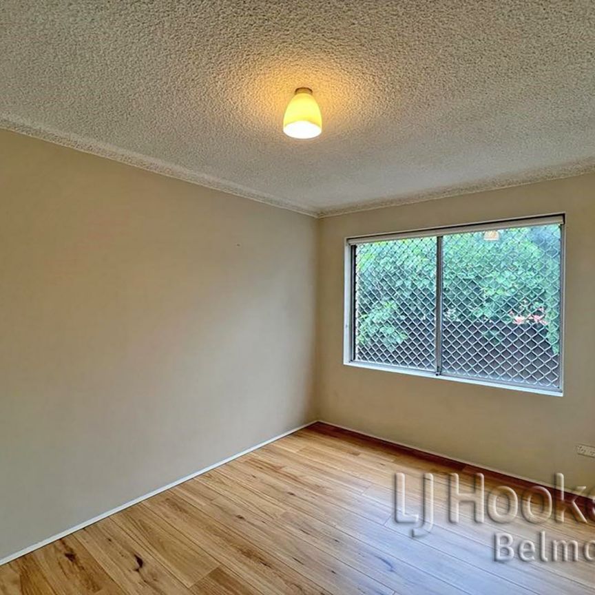 Spacious Two Bedroom Unit with Lockup Garage! - Photo 1