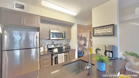 BEAUTIFUL 1+DEN CONDO WITH STUNNING CITY VIEWS - Photo 3