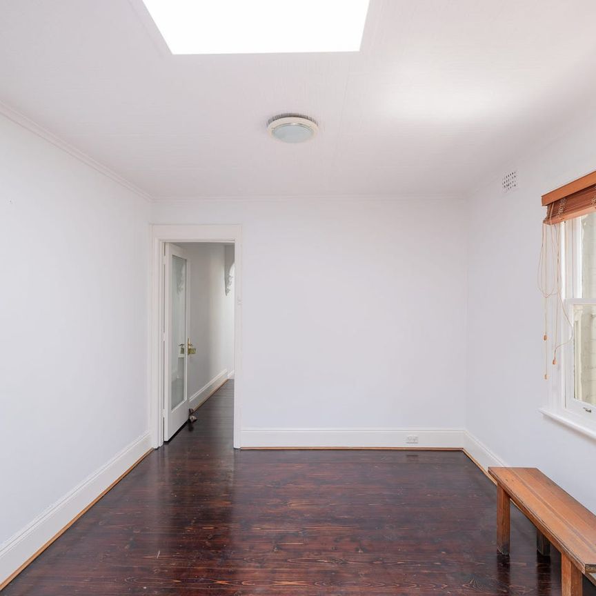 Sunlit terrace living in a premier village pocket - Photo 1