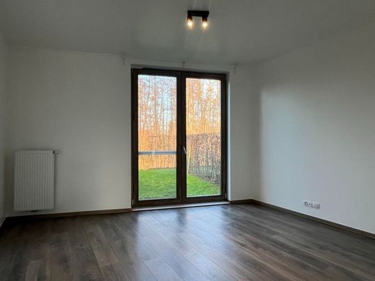 Centraal gelegen één slaapkamer appartement ('A' - label) met privatieve voor- en achtertuin - Photo 1