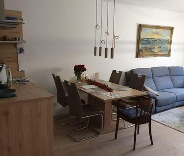 Moderne 3-Zimmer-Wohnung mit Garten und Tiefgarage - Photo 1