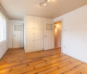 Stadswoning met drie slpk en tuintje op gunstige locatie - Photo 4