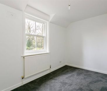 An updated two bedroom semi-detached cottage located in the village... - Photo 5