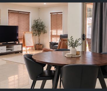 Spacious Family Home with Versatile Living Spaces - Photo 2