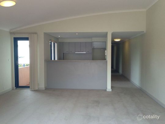 Top Floor Two-Bedroom Apartment With Parking - Photo 1