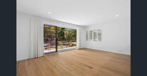 Renovated Beachside Apartment, Sunlit North-Facing Living - Photo 1