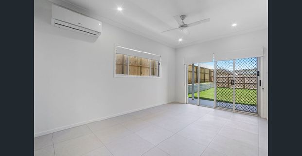 Modern Family Living – Brand New 4 Bedroom Home with Spacious Yard - Photo 1