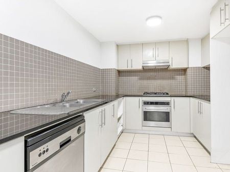 Sensationally Renovated Two Bedroom Modern Delight In Prime Location - Photo 4