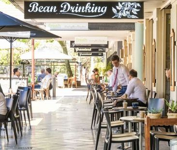 Bright and Spacious Townhouse with Private Courtyard & Double Garage - Photo 6