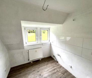 Charmante 2-Zimmer-Dachgeschosswohnung mit Wohlfühlatmosphäre!! - Foto 1