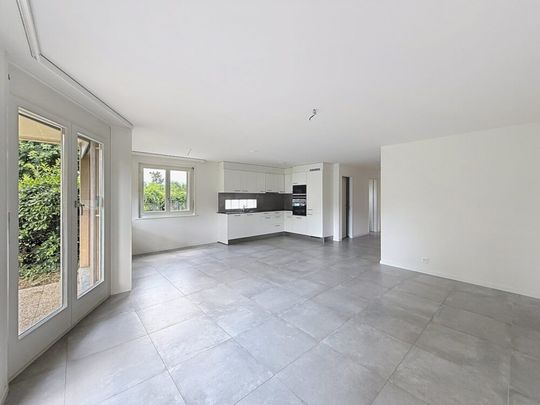 Appartement de 3.5 pièces au rez-de-chaussée - Photo 1