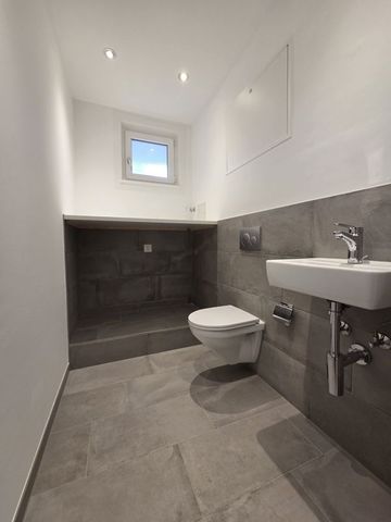 Grosszügige und moderne Dachwohnung im Gundeli - Photo 2