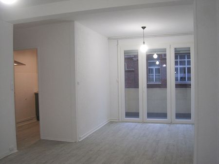 A LOUER BEL APPARTEMENT PROCHE CENTRE VILLE ST QUENTIN 02100 - Photo 3