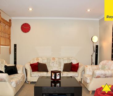 This immaculate four bedroom home is both private and welcoming and... - Photo 2
