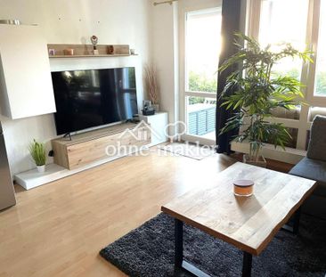 Gepflegte 2-Zimmer-Wohnung mit Einbauküche, Terrasse mit Gartenante... - Foto 1