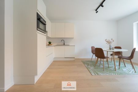 Lichtrijk en gerenoveerd 2 slpk appartement met terras - Photo 4