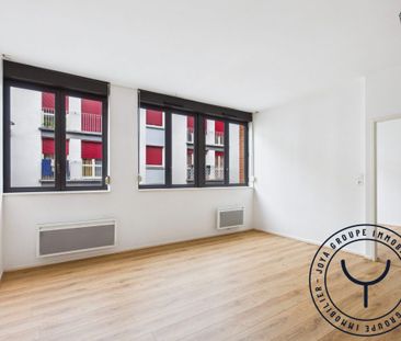 En plein centre ville avec stationnement - Photo 3