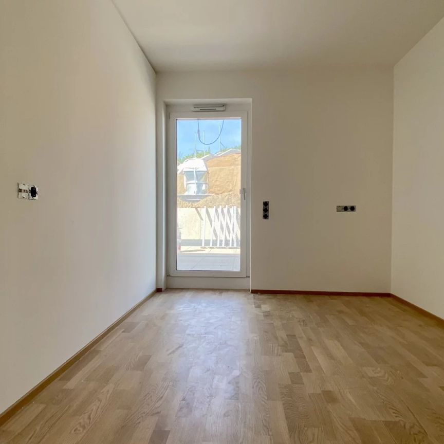 Neubau Erstbezug Ruhige Drei Zimmer Wohnung mit großer Terrasse - Foto 1