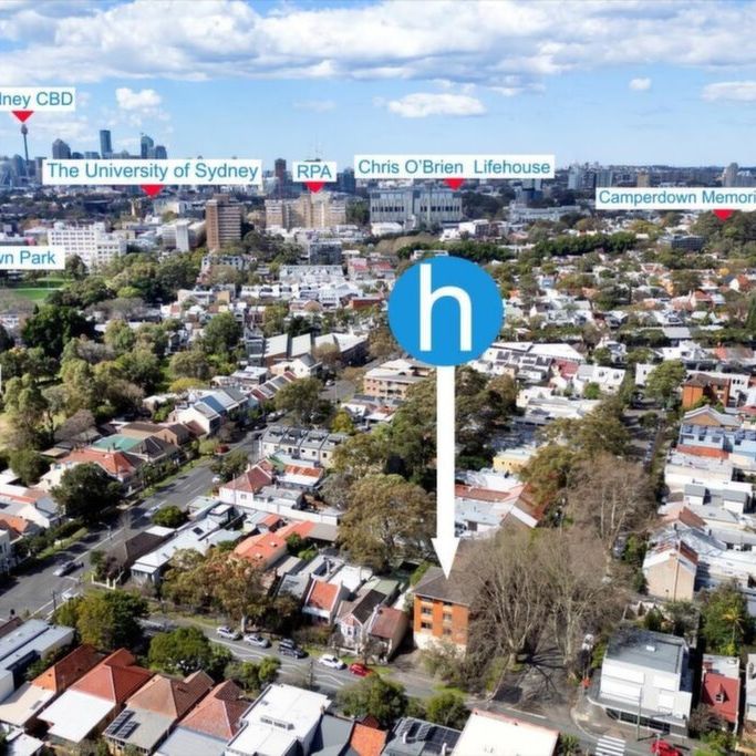 Renovated Top-Floor Apartment with Leafy Outlook & Oversized Garage - Photo 1