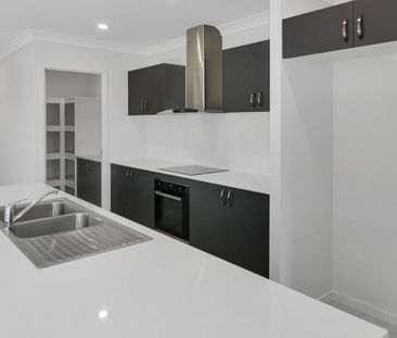 Brand New 4 Bedroom Home with Modern Living - Photo 2